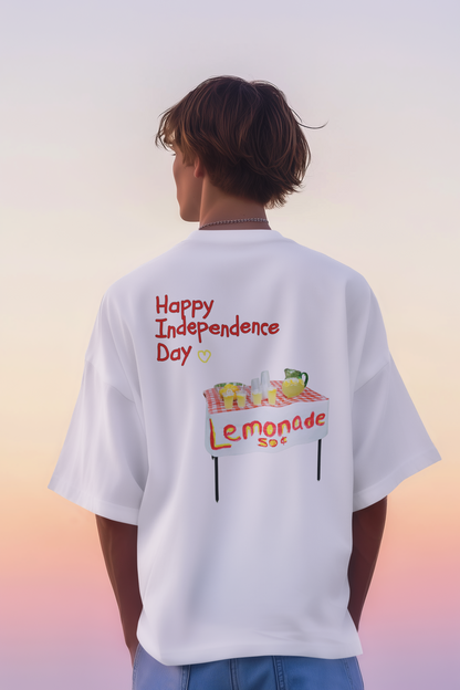 A man wearing The Lemonade Table, Unisex Oversized White T-shirt for 4th of July at back view – Unique Fashion Tops – Cool, Comfortable, Standout, Design for all age with Front and Back Print – Oh Mine Words