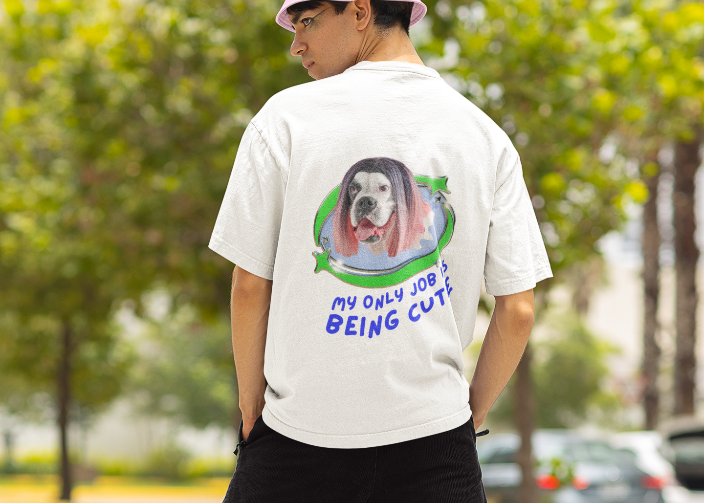 A man wearing Unisex Oversized "My Only Job Is Being Cute (23-Style)" White T-shirt, Back view - Bulldog wears highlight Pink Wig, Y2K Style, Funny Tee – Unique Fashion Tops - Front and Back Print - Oh Mine Words.