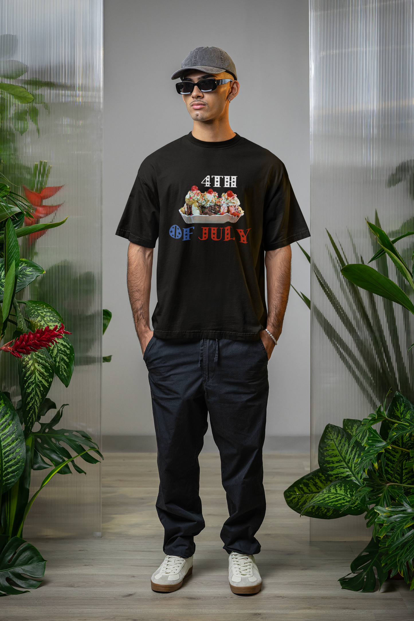A man wearing Unisex Oversized "Sundae of July" Black T-shirt at Front view - Unique Fashion Tops, 4th of July Graphic, Front and Back Print - Oh Mine Words.