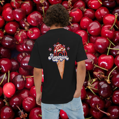 A man wearing unisex oversized "America on a cone (Black)" t-shirt at back view - Unique Fashion Tops, 4th of July, Ice cream cone, whipped cream and star graphic, Front and Back Print - Oh Mine Words.