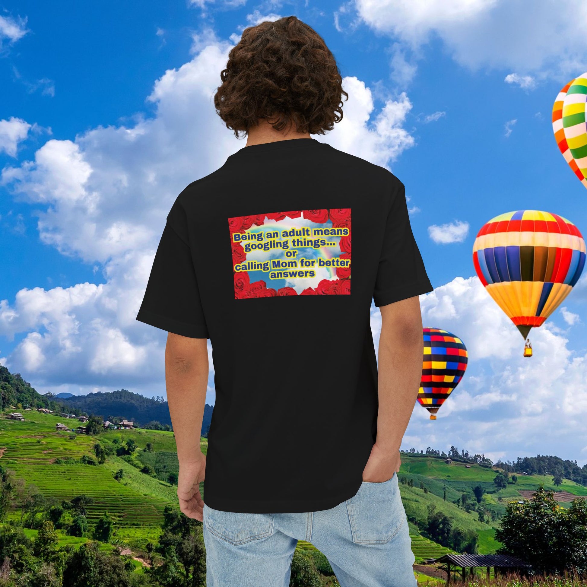 A man wearing unisex oversized "Being An Adult Means.. (Black)" t-shirt at back view - unique fashion tops, red roses frame, y2k style, sky and rainbow, funny quote for Adulthood and Mother's Day - Front and Back Print - Oh Mine Words.