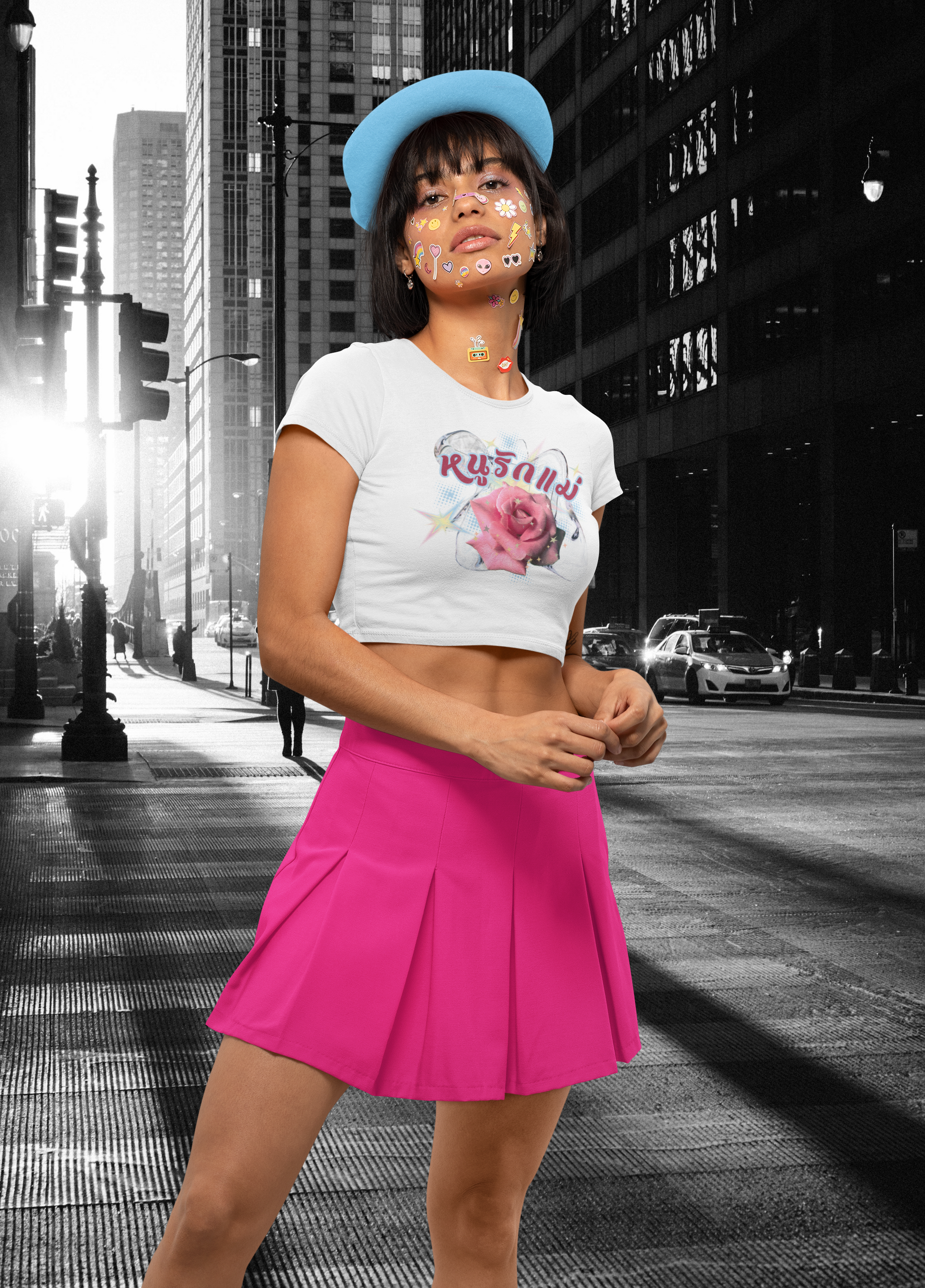 A women wearing "หนูรักแม่ เบบี้ที (ดอกกุหลาบ) - I Love Mom Baby Tee (Rose)" white baby tee/ crop top/ slim fit tee at front view - Unique fashion tops perfect for casual wear and Mother's day - Thai twist Y2k style - Front and Back printed t-shirt - Oh Mine Words