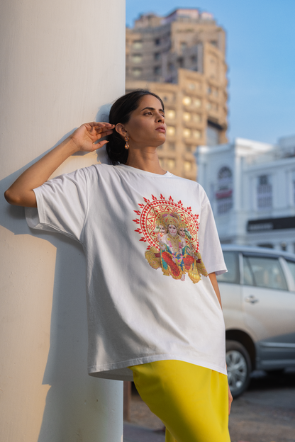 A women wearing "Hanuman Ji" unisex oversized white T-shirt at Front view. Unique fashion tops - wear comfy, chic and cool with God and Religious graphic. Front and back printed - Oh Mine Words