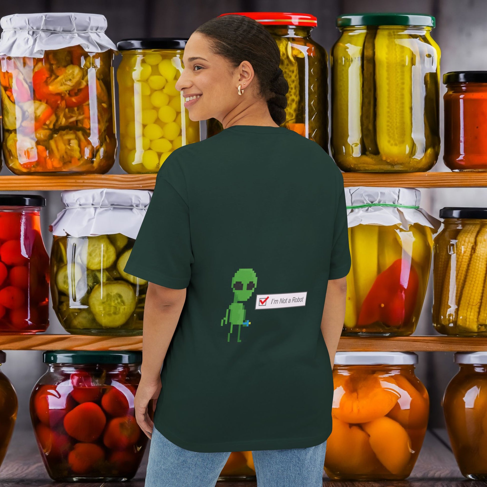 A women wearing I'm Not a Robot (003) Oversized Boxy Tee at back view - comfy unisex t-shirt shade green forest. Unique fashion tops, funny, standout, chic and cool with Alien Pixel Art design. Perfect for teenage. Front and back printed - Oh Mine Words
