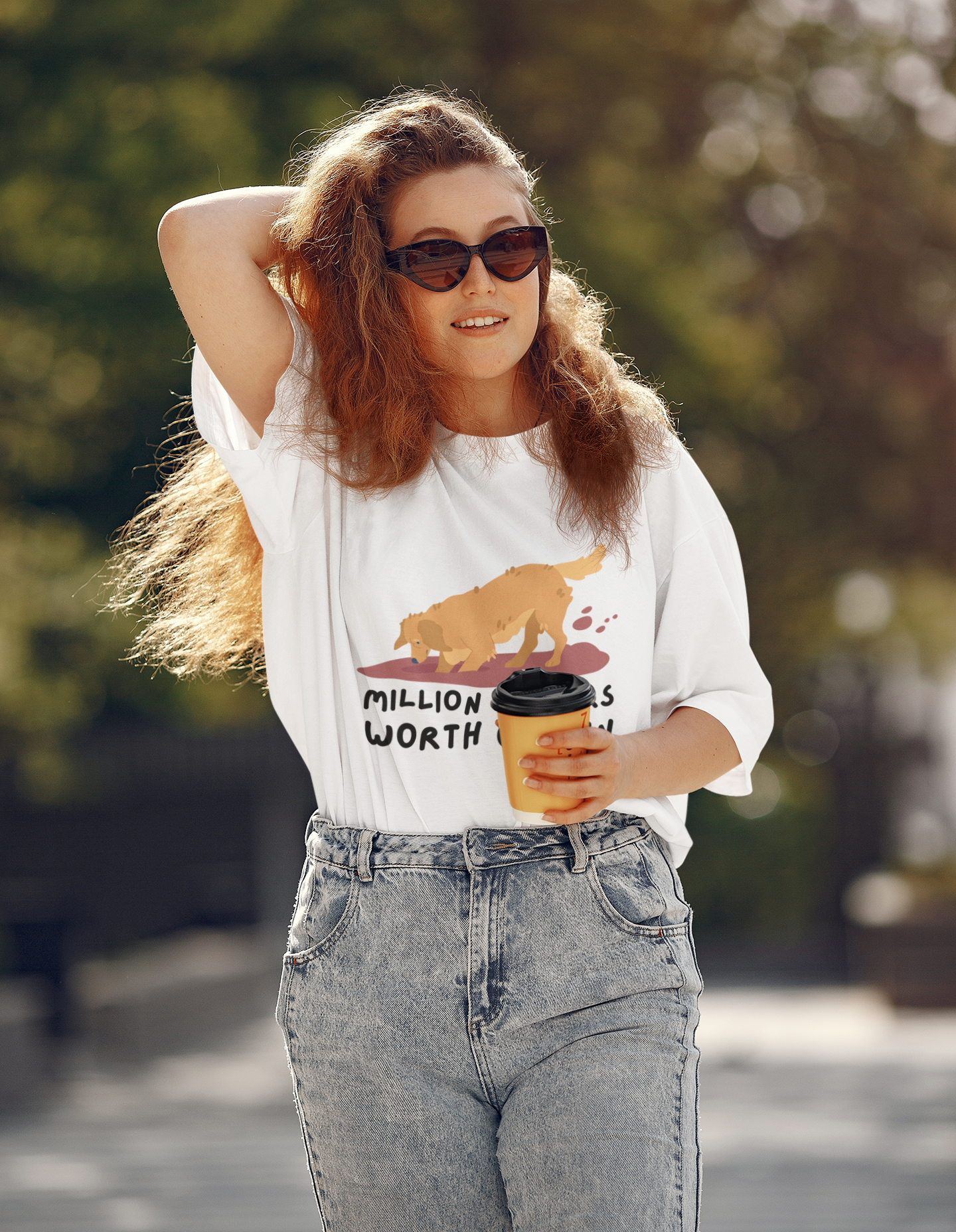 A women wearing "Million Dollars Worth of Fun" Unisex Oversized White Tee at front view. Unique fashion tops - comfy, graphic, funny quote t-shirt for dog lover. Front and back printed - Oh Mine Words