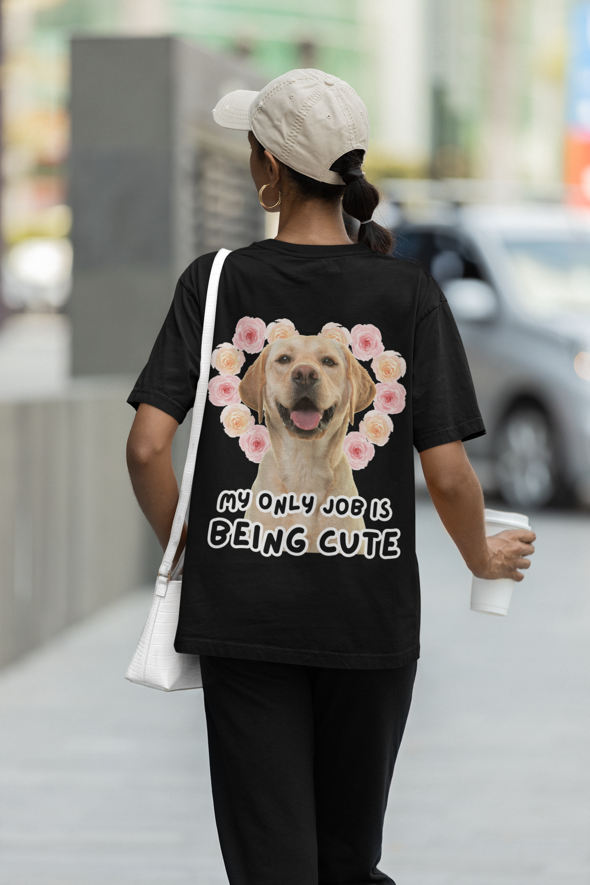 A women wearing "My Only Job Is Being Cute (08-Style)" Unisex Oversized Black T-shirt, Back view - Golden Retriever and Rose Graphic Design – Unique Fashion Tops - Front and Back Print - Oh Mine Words.