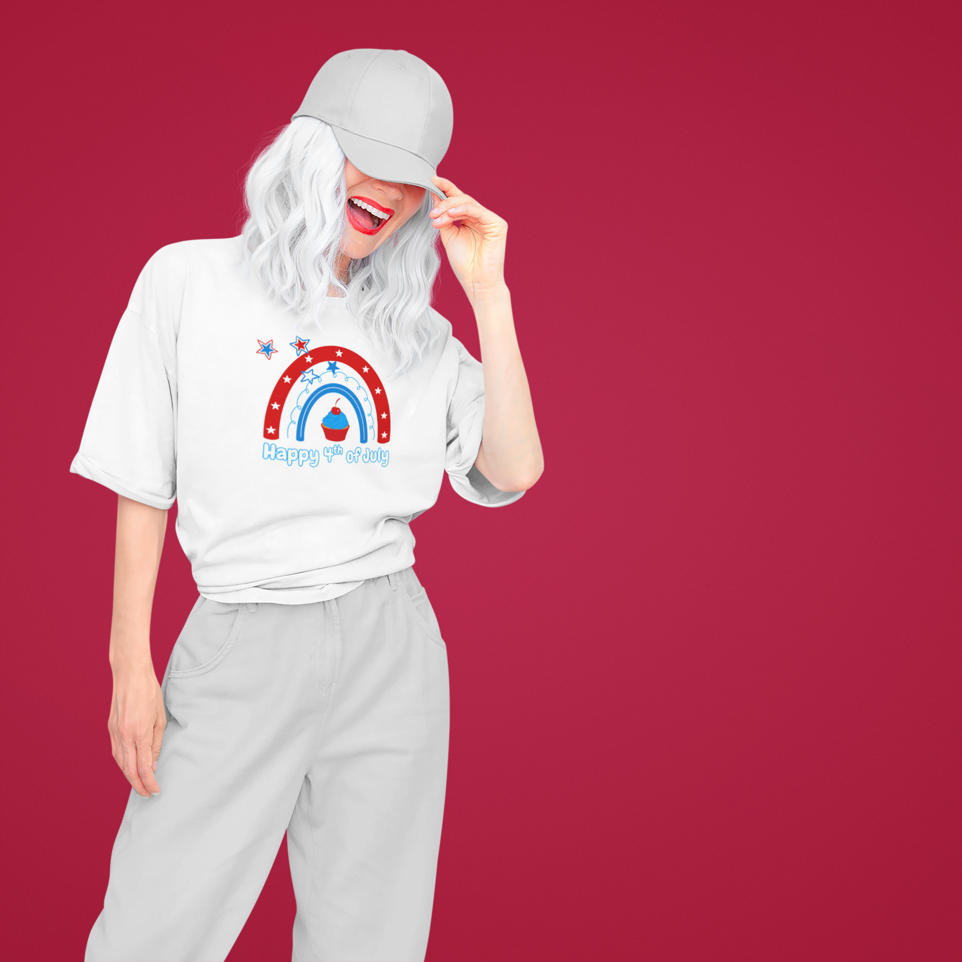 A women wearing Unisex Oversized "Mini Cupcake of July" White T-shirt at Front View - Unique Fashion Tops, Design for 4th of July, Front and Back Print - Oh Mine Words.
