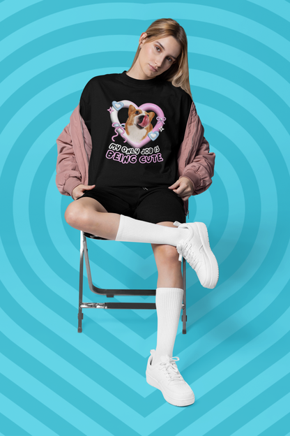 A women wearing Unisex Oversized "My Only Job Is Being Cute (06-Style)" Black T-shirt - Licky Corgi in Y2k Heart Frame in Front view – Unique Fashion Tops - Front and Back Print - Oh Mine Words.