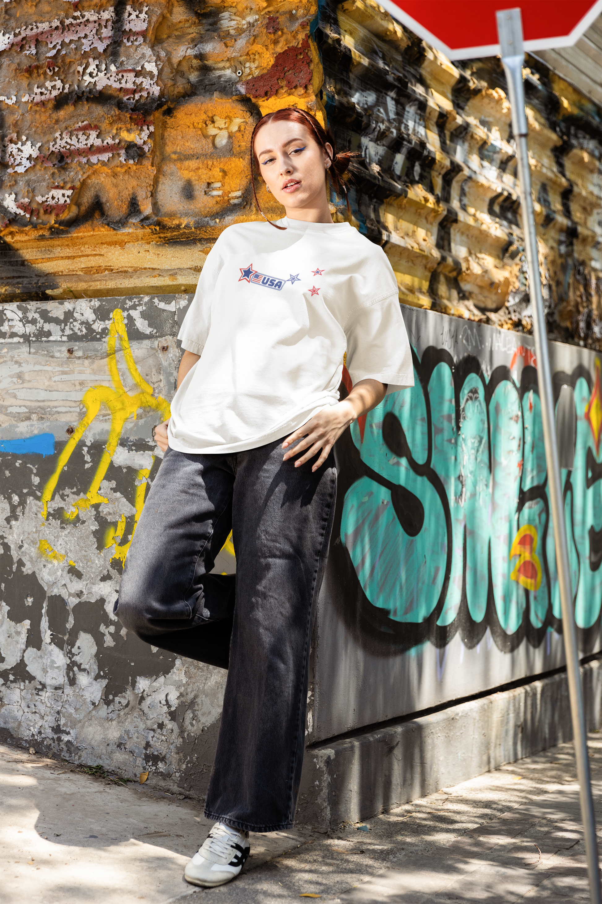 A women wearing Unisex Oversized "Stickies USA" White T-shirt at front view - Unique Fashion Tops, Classic design, perfect for American and to wear in 4th of July. Front and Back Print - Oh Mine Words.