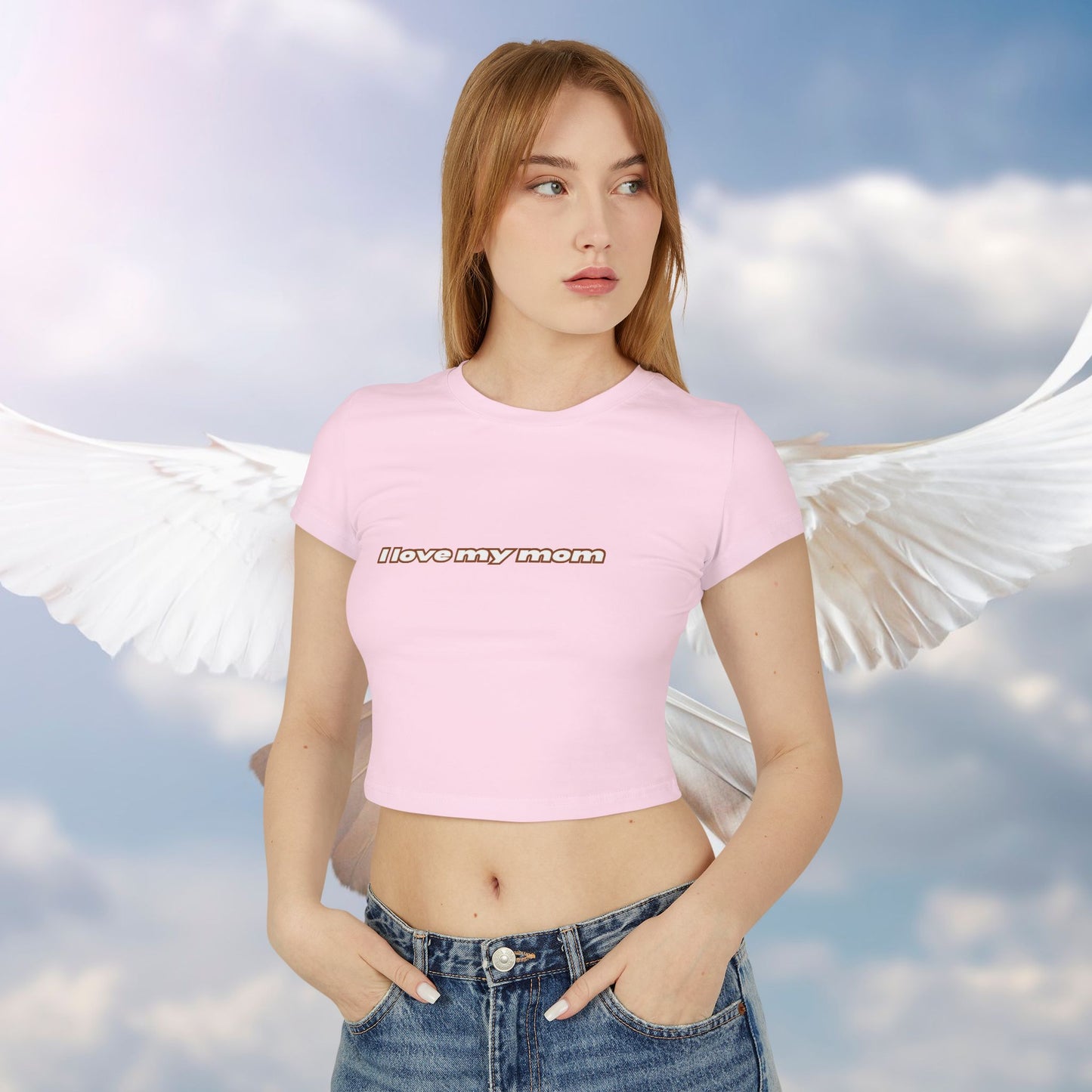A women wearing light pink "I Love My Mom Baby Tee (Basic)"/ crop top/ slim fit tee at front view - Unique fashion tops for casual wear and Mother's day - Minimal Y2k style - Front and Back printed T-shirt - Oh Mine Words