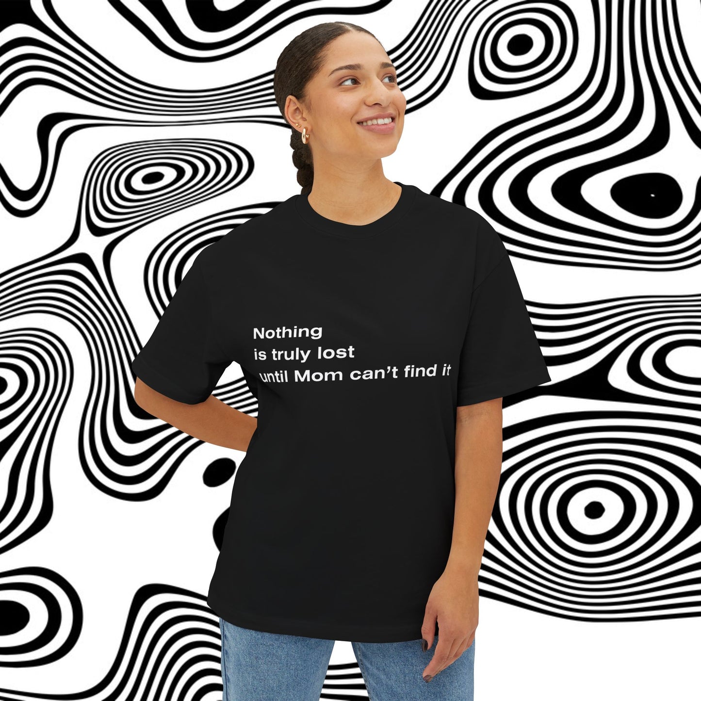 A women wearing unisex oversized "Nothing is truly lost until Mom can't find it (Black)" t-shirt at front view - unique fashion tops - funny quote for Adulthood and Mother's day - Front and Back Print - Oh Mine Words.