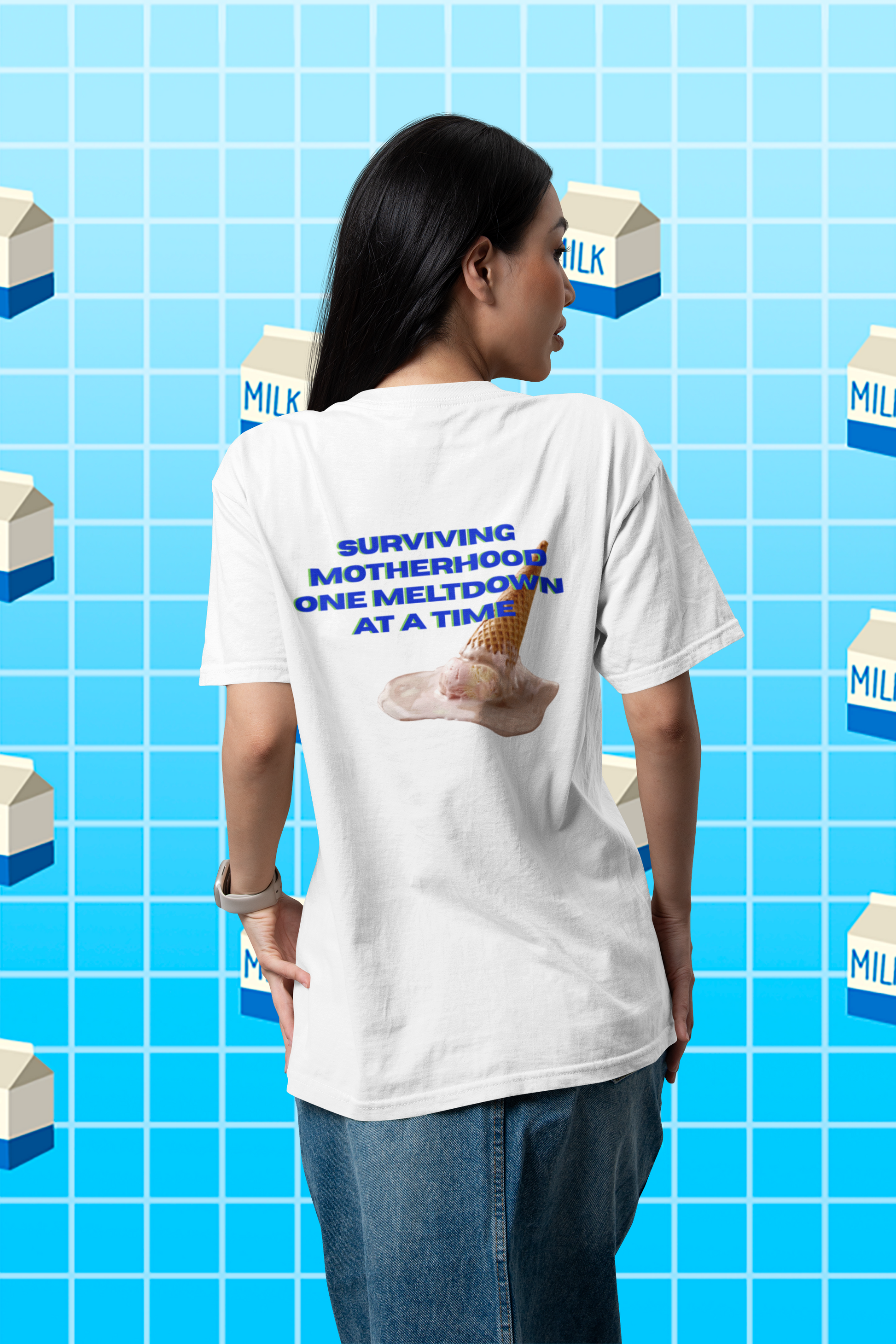 A women wearing unisex oversized "Surviving Motherhood One Meltdown At A Time (White)" t-shirt at back view - unique fashion tops, funny quote, Ice cream melt down for A Mom and Mother's day - Front and Back Print - Oh Mine Words.