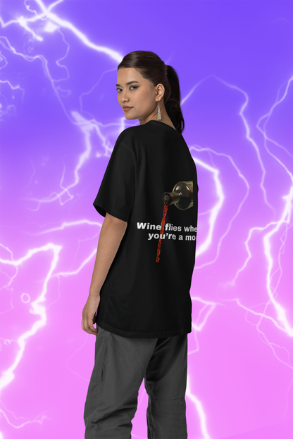 A women wearing unisex oversized "Wine flies when you're a mom (Black)" t-shirt at back view - unique fashion tops, funny quote, cool design for A Mom and Mother's day - Front and Back Print - Oh Mine Words.
