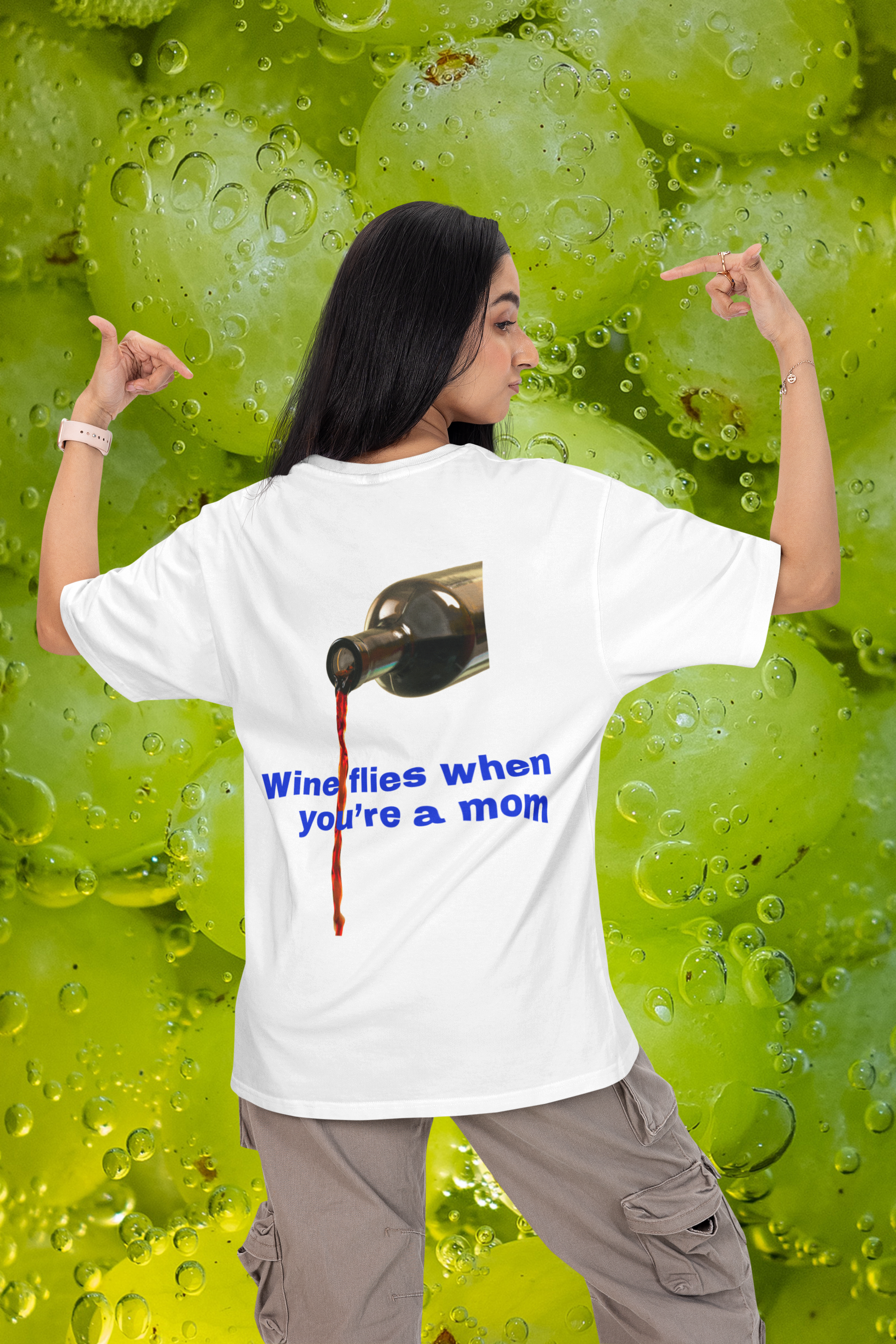 A women wearing unisex oversized "Wine flies when you're a mom (White)" t-shirt at back view - unique fashion tops, funny quote, cool design for A Mom and Mother's day - Front and Back Print - Oh Mine Words.