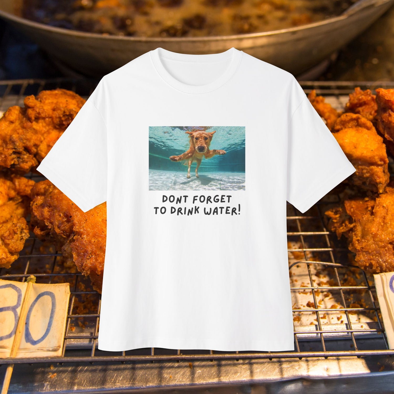 Front view of "Don't Forget To Drink Water!" Unisex Oversized White Tee. Unique fashion tops - cute and funny quote. Perfect for dog lovers. Front and back printed - Oh Mine Words